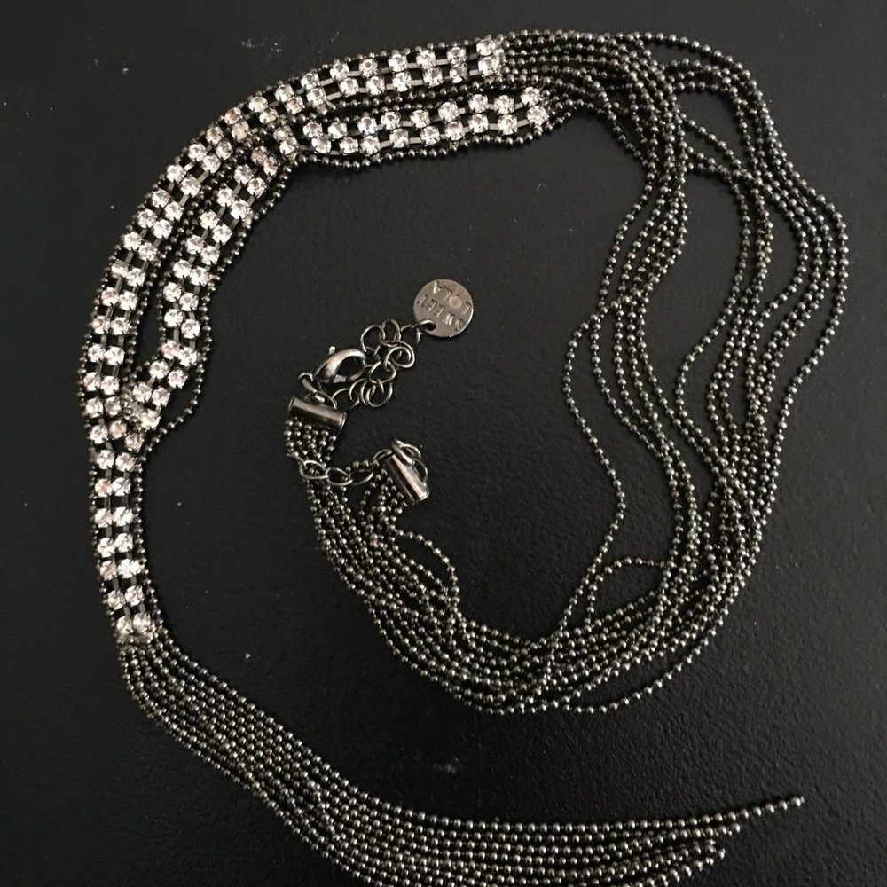 Lariat style rhinestone necklace.